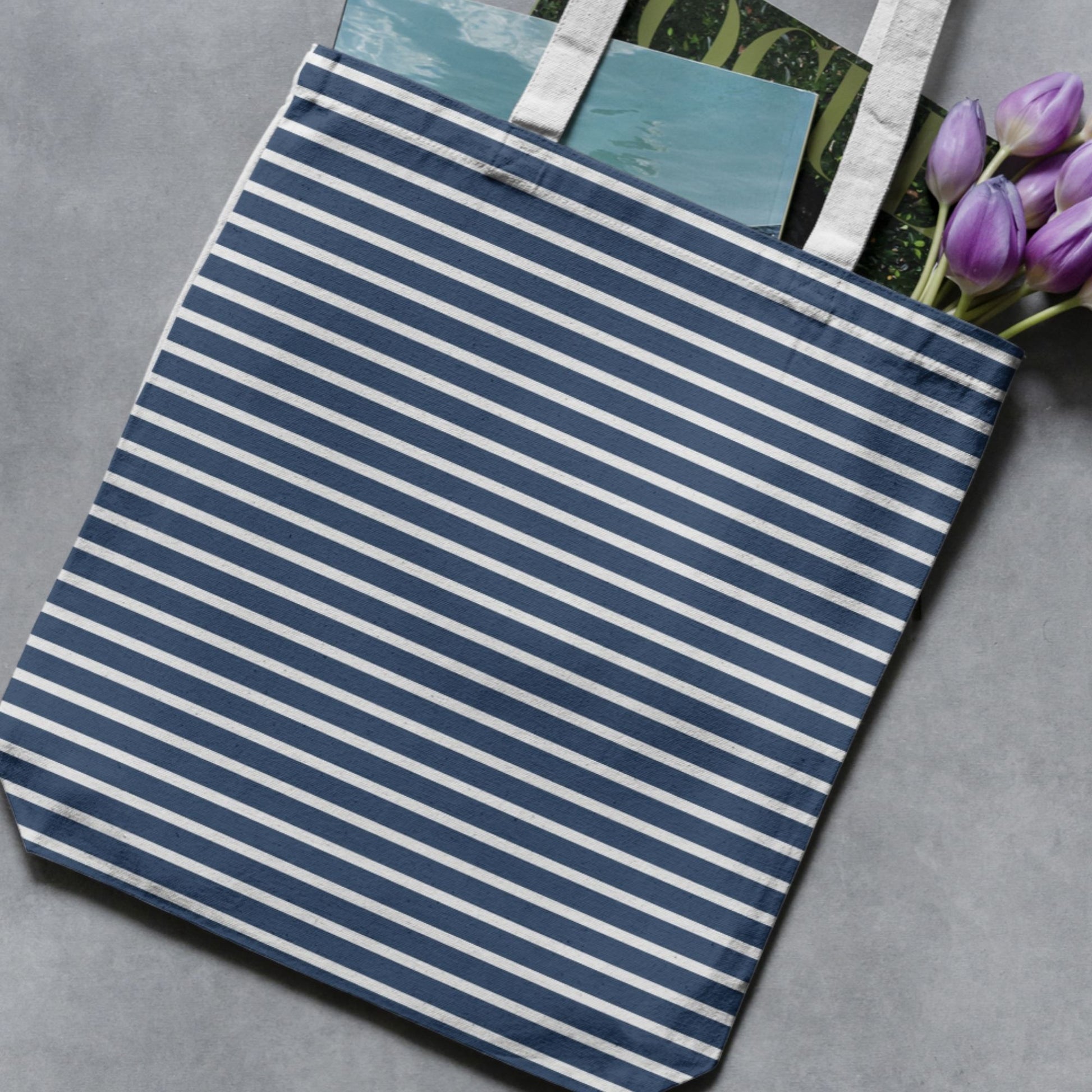 Navy and white striped seamless pattern applied to a fabric tote bag as a finished-product example.
